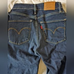 Levi high rise skinny jeans dark blue wash size 24